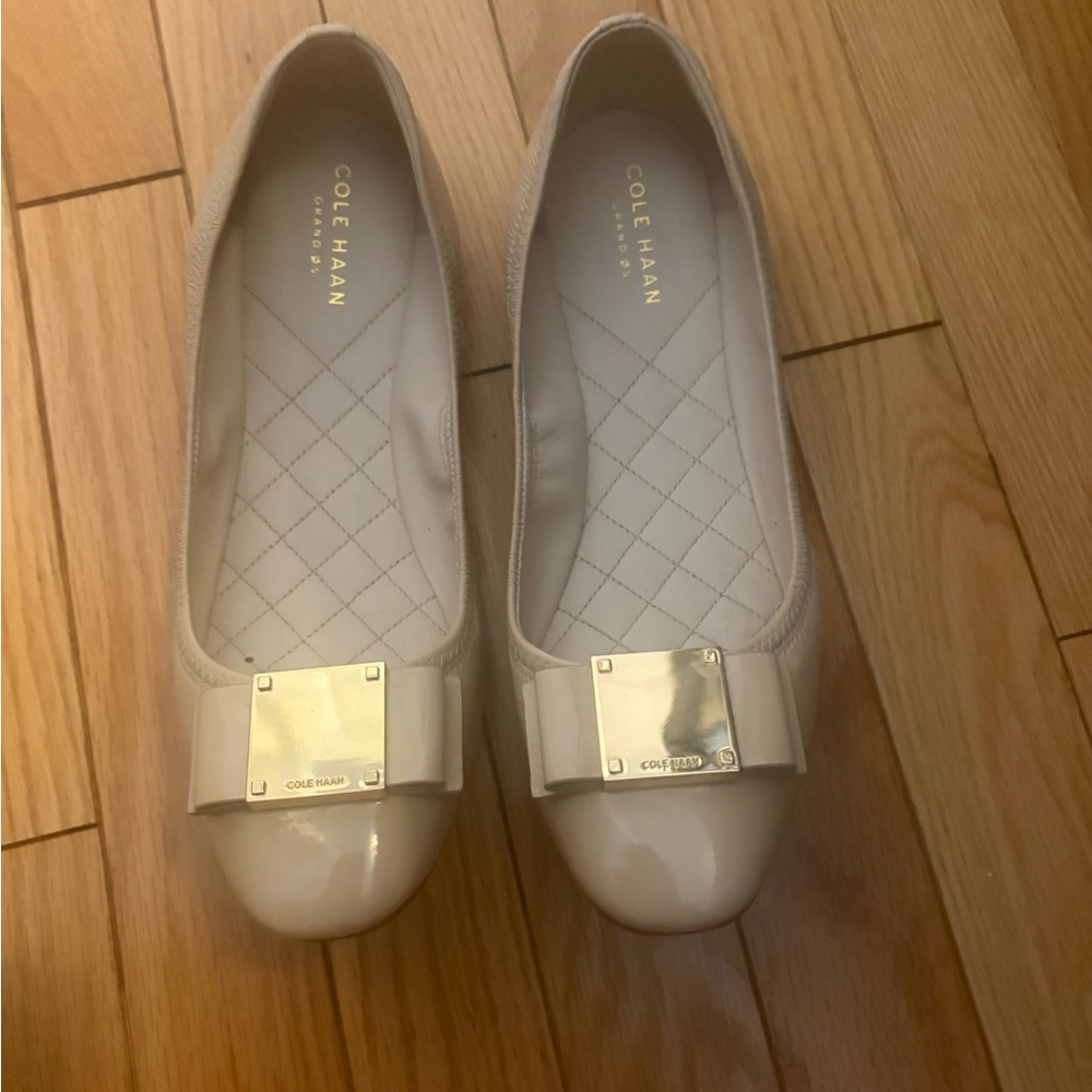 Cole Haan Women's Beige Patent Flats with Bow Accent